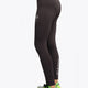Model wearing the Osaka Kids Baselayer Tights in Black. Side view