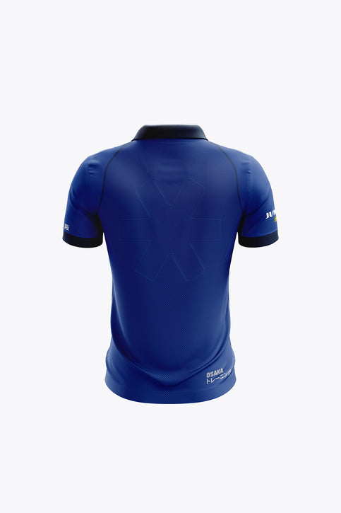 Royal blue polo jersey with button placket, collar, and front crest logos