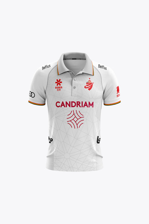 Kids white polo jersey with button collar, front crest and red sponsor print