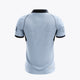 Kids sky blue polo jersey with black collar and sleeve trim, back view