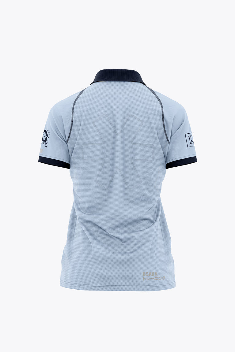 Women’s sky blue polo jersey, navy-trimmed collar and sleeves, back graphic and logo