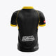Kids' black polo jersey with yellow sleeve trim and back sponsor logo