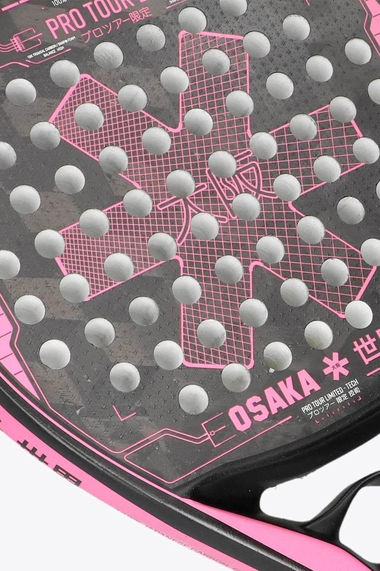 Black with pink accents Pro Tour LTD Padel Racket Tech, made with a technical teardrop shaped racket for high skill, smaller sweetspot for higher agility, precision and much more power, for a higher playability. Close-up front view