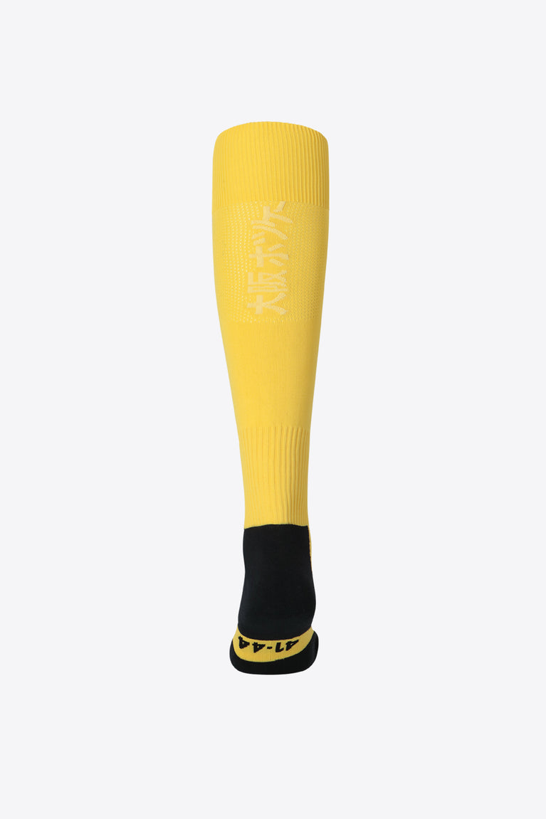 Honey Comb yellow color socks for modern hockey players. Different weaves support and compress your legs and feet. Photo of back