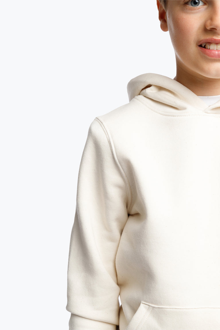 Cream Osaka Kids College Initials Hoodie for everyday use. Cotton mix with traditional details. Osaka logo in a fun print. Photo boy left shoulder