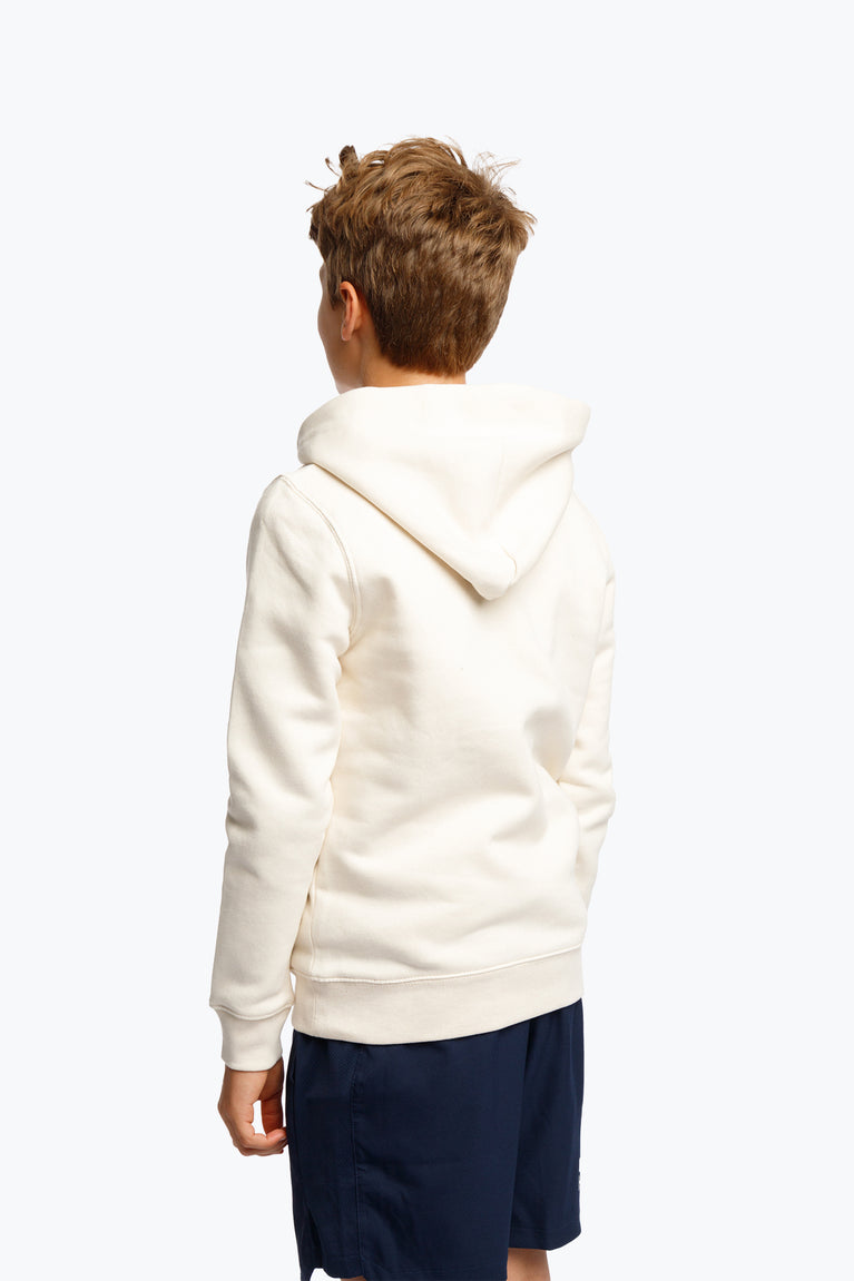 Cream Osaka Kids College Initials Hoodie for everyday use. Cotton mix with traditional details. Osaka logo in a fun print. Photo boy left back side view