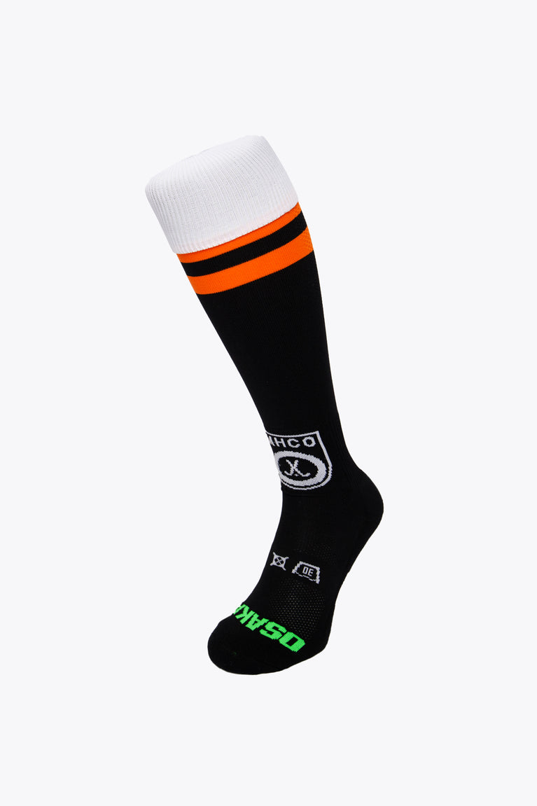 MHCO Field Hockey Socks in black and orange with Osaka logo in green. Front view