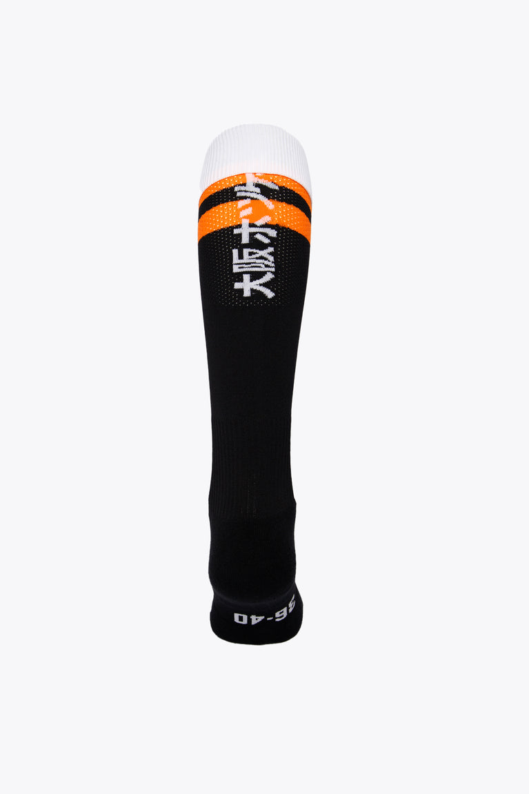 MHCO Field Hockey Socks in black and orange with Osaka logo in green. Back view