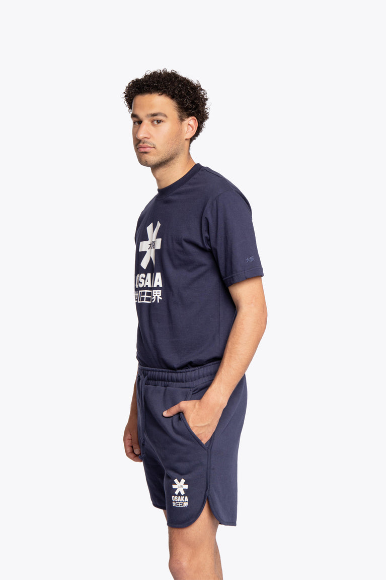 Navy colour Osaka Jersey shorts for men made to be a wardrobe classic. Made to be timeless for on and off the field. Made with 80 percent cotton and 20 percent polyester - photo of model from knee and upwards